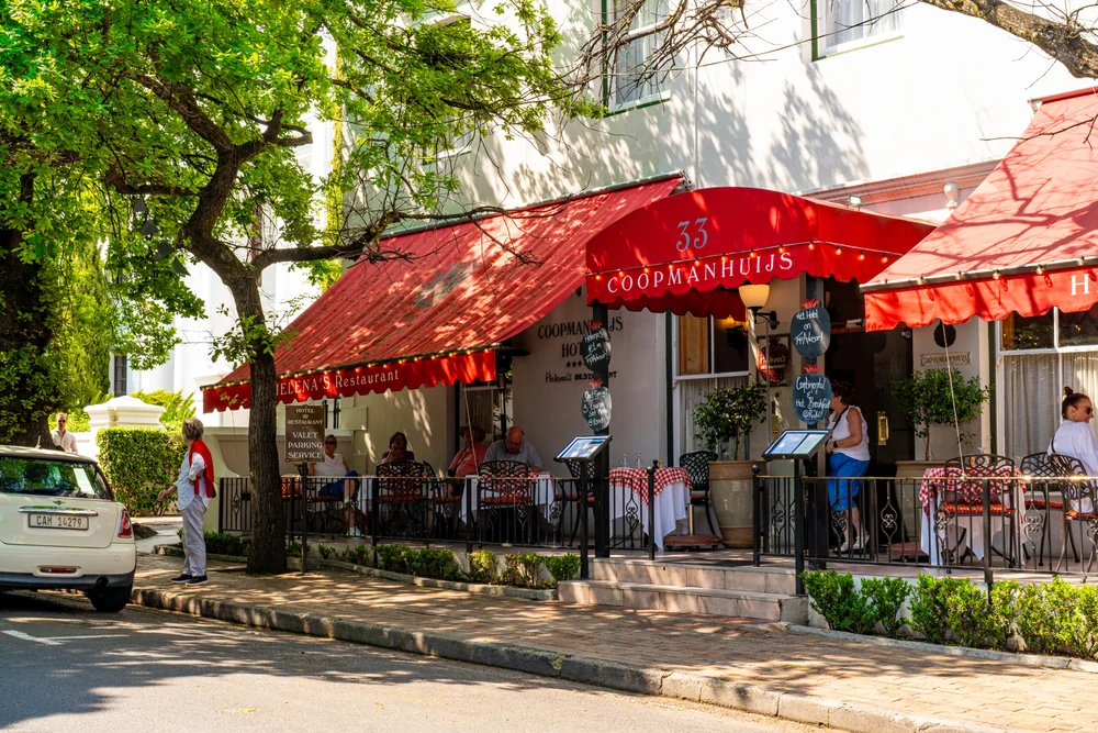 Helena’s Restaurant beneath the red Coopmanhuijs awnings at 33 Church Street, Stellenbosch